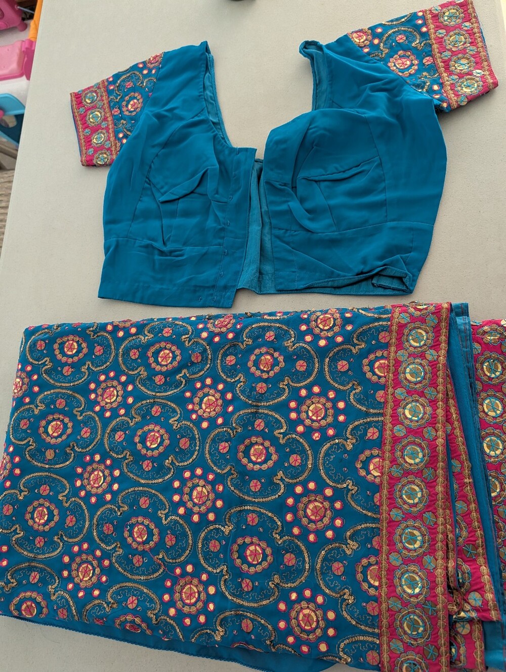 Teal Embroidered Women’s Blouse and Saree Set